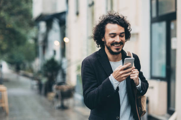 istock Man texting in the city 864124402