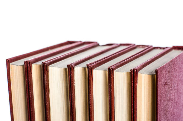 A pile of books on white background isolated