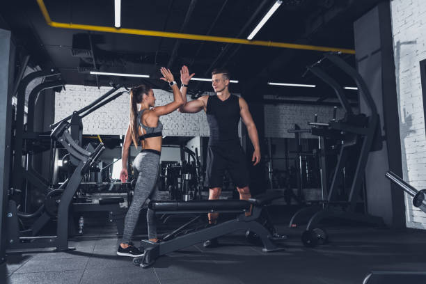 istock couple giving high five to each other 864149218