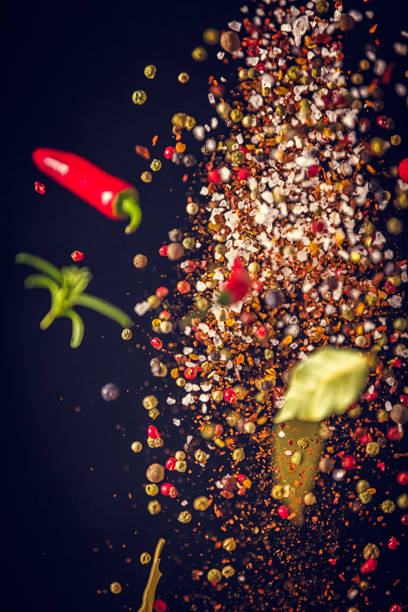 istock Spice Mix Food Explosion with Chili and Peppercorns 864158350