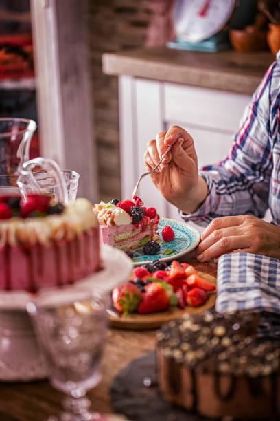 istock Eating Berry Layer Cake with Whipped Cream 864158448