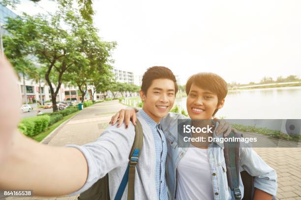 Taking Photo Together Stock Photo - Download Image Now - Adult, Adults Only, Asian and Indian Ethnicities