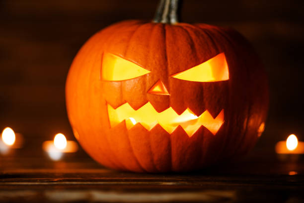 istock Halloween pumpkin and candles 864168374