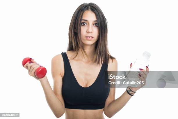 Portrait Of Fit Girl Holding Water And Weight Stock Photo - Download Image Now - Active Lifestyle, Adult, Adults Only