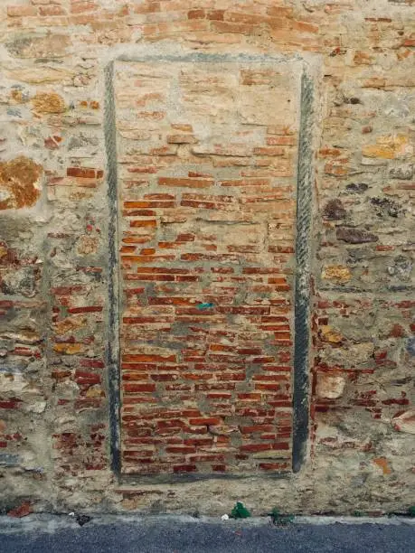 Bricked-up door in a brickwall