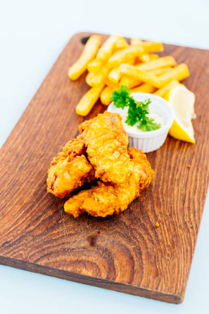 istock Fish and chip with french fries 864173096