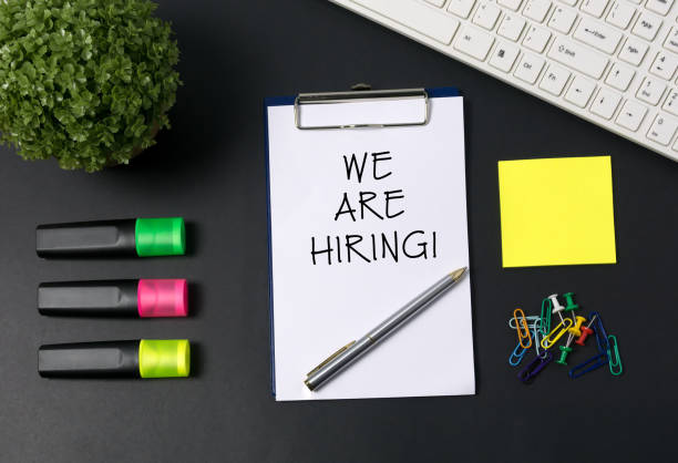 istock We Are Hiring Word on Placard 864175978