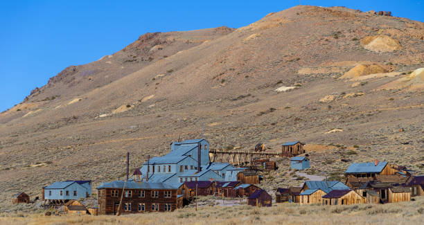 istock abandoned old decayed wild western gold ghost town in decay, usa 864198140