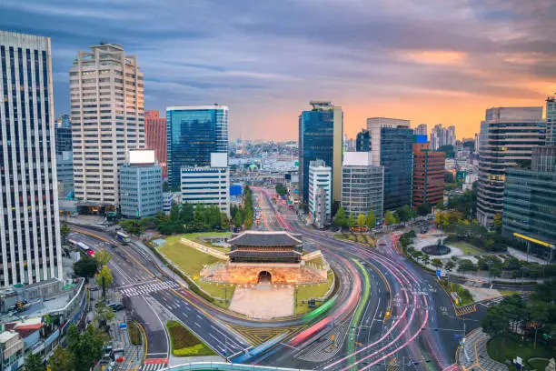 Image of Seoul downtown with Sungnyemun Gate during sunset.
