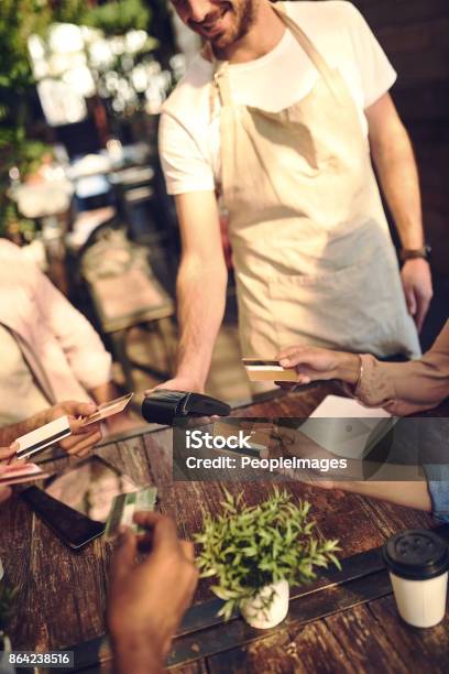 Lets All Pay Stock Photo - Download Image Now - Credit Card, Lens Flare, Men