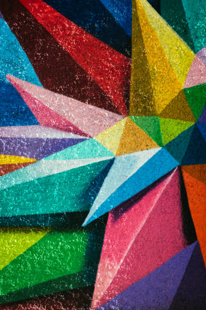 Mural Paint in Madrid, Spain Mural Paint in Madrid, Spain, the wall is full of edges and colors street art stock pictures, royalty-free photos & images