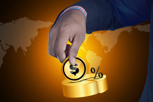 istock Man holding dollar and percentage sign 864251842
