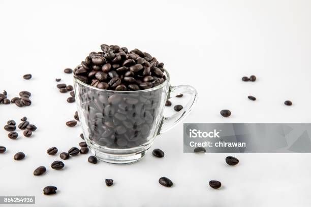 Coffee Beans In Glass Cup Stock Photo - Download Image Now - Arabica Coffee - Drink, Black Color, Brown