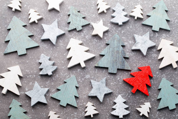istock Christmas wooden decor on the snow background. 864259420