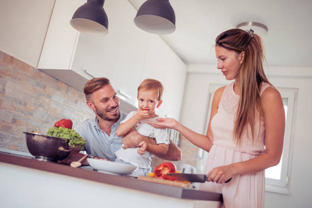 istock Happy family in the kitchen 864291494