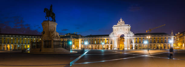 istock Lisbon Praca do Comercio Augusta Arch illuminated night panorama Portugal 864308328