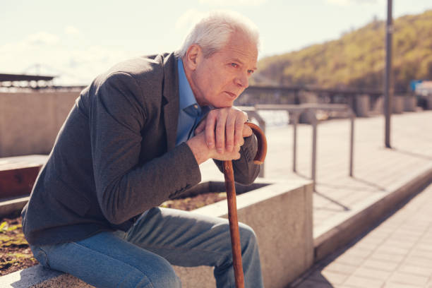 istock Melancholic senior man remembering his youth 864313472