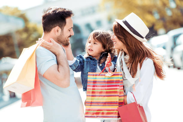istock Young family in shopping 864315736