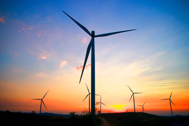 istock Stock Photo - Wind power at sunset 864316918