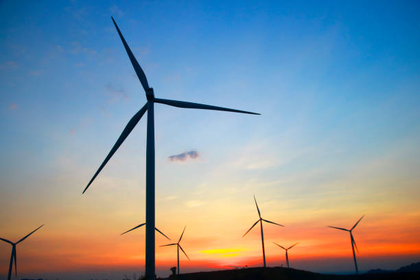 istock Stock Photo - Wind power at sunset 864320684