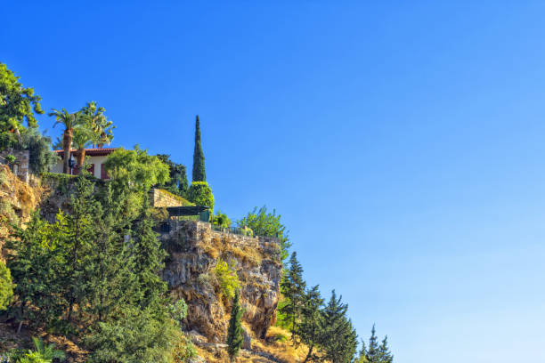 istock Building with a balcony on a cliff. Antalya, Turkey 864330256
