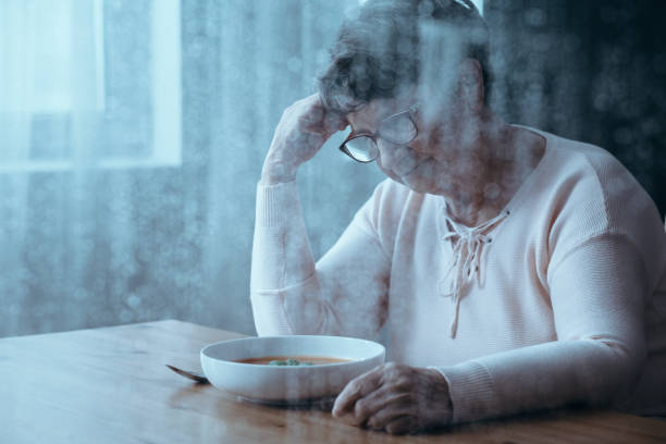 istock Elderly woman with eating disorders 864334558