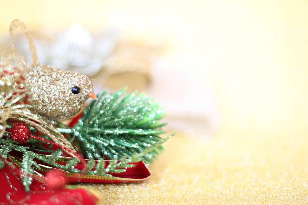 Christmas Gold Ornaments Background. Very shallow depth.