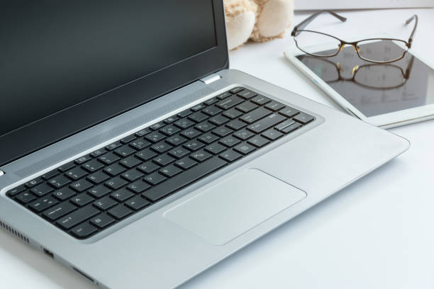 istock Computer laptop and tablet on desk business and technology background with electronic device. 864337958