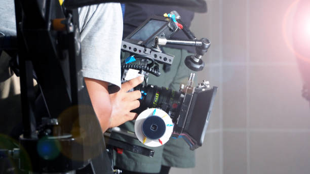 istock Blurry image of video production and light flare 864338664