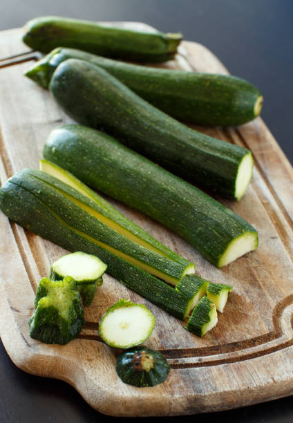 istock Fresh zucchini on wooden board 864345852