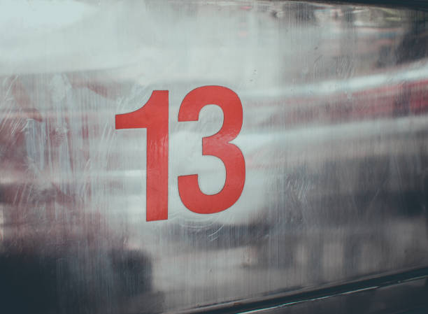 istock No. 13 on metal background 864346320
