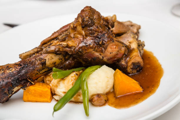 istock Lamb Shank with Gravy and Vegetables 864352474