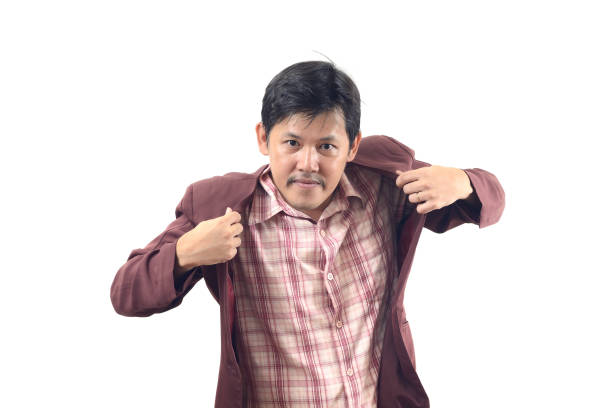istock Businessman holding both hands on his suit isolate on white background 864375824
