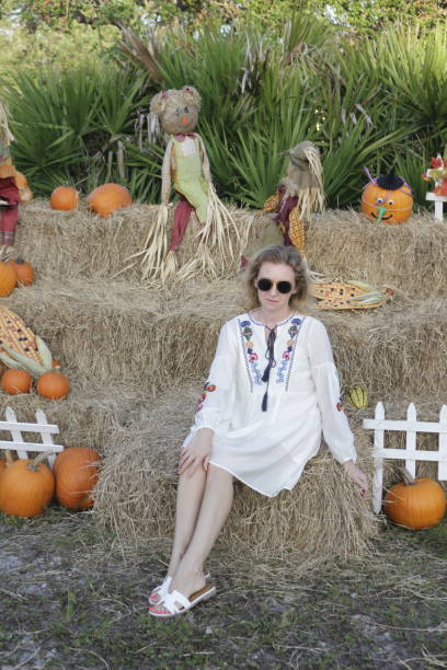 istock Fall decoration and woman. 864395434