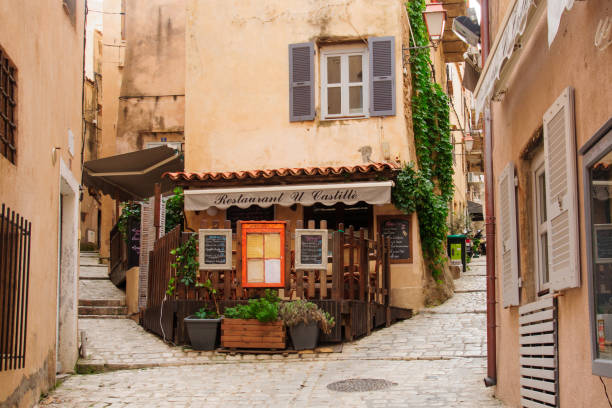 Bonifacio Alley, Corsica Bonifacio: An alley in the old city of Bonifacio, in Corsica, France table ledge stock pictures, royalty-free photos & images