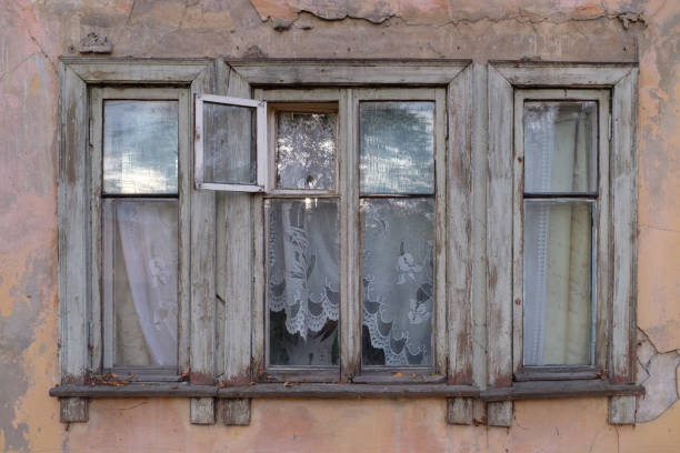 istock old window in the old house 864399670