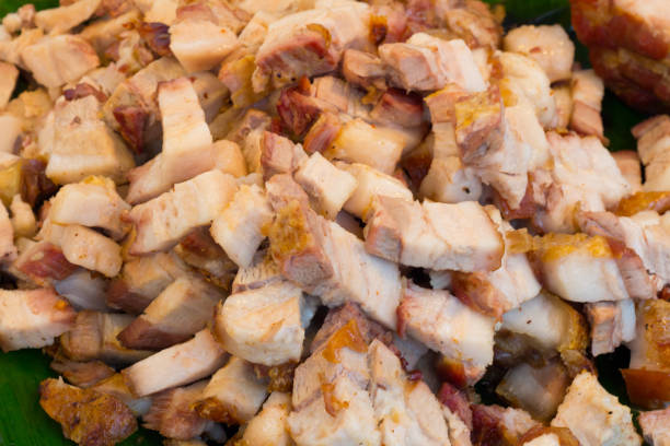 istock Close up Thai roasted crispy pork on banana leaf 864402646