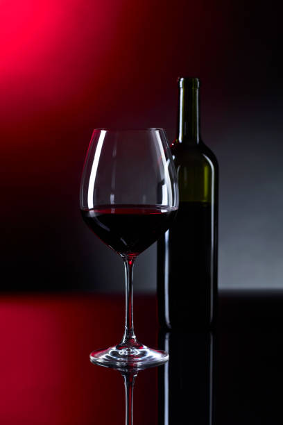 istock Glass and bottle of red wine. 864408948