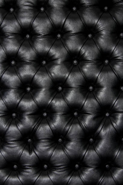 istock Luxurious black leather texture furniture with buttons 864412760