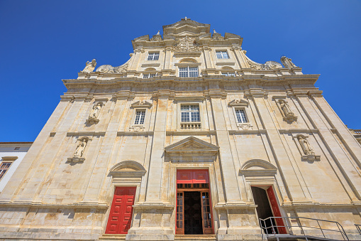 The main facade of the New Cathedral of Coimbra, Se Nova de Coimbra, is a Catholic church of Coimbra in Baroque style. Coimbra is one of the oldest university cities in Europe. Central Portugal.