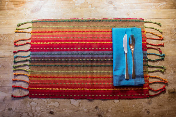 istock Colorful American Southwest inspired dinner place setting on a rustic wood table 864414114