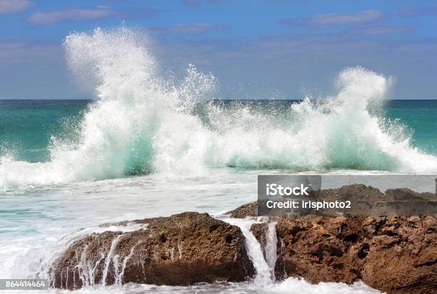Sea Wave Crashing On Rocks Stock Photo - Download Image Now - Rock - Object, Sea, Wave - Water