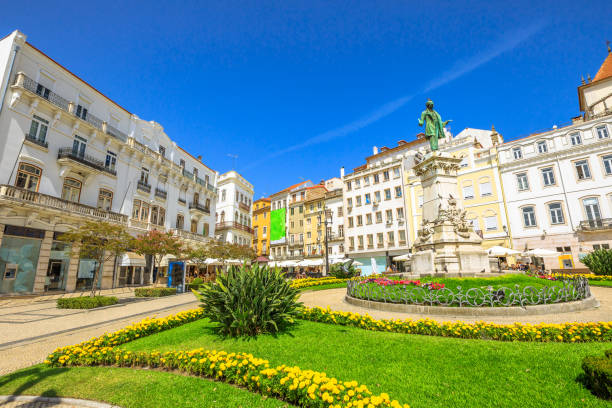 Coimbra historic center Largo de Portagem square in a beautiful sunny day with blue sky. Historic center of Coimbra in Central Portugal, Europe. coimbra city stock pictures, royalty-free photos & images