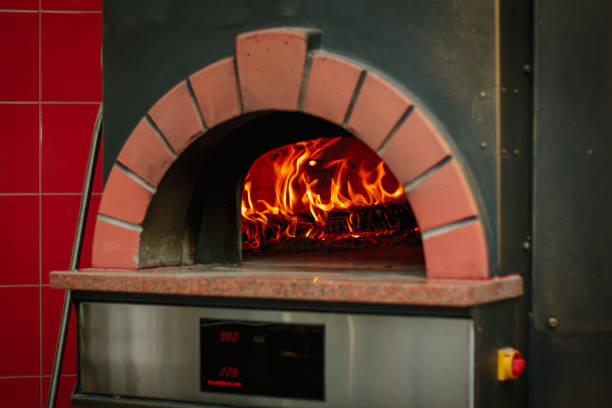 istock Fire flame in a traditional pizza oven. 864416526