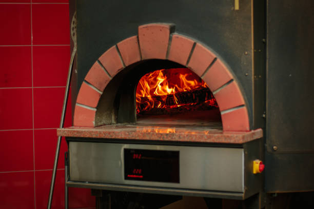 istock Fire flame in a traditional pizza oven. 864416568