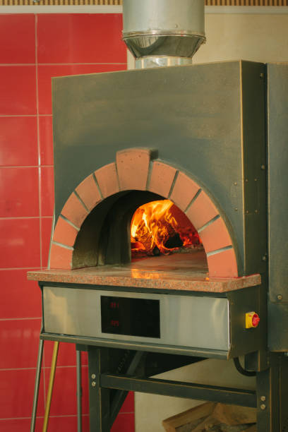 istock Fire flame in a traditional pizza oven. 864416878
