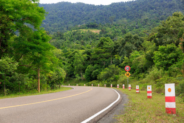 istock Road Signs Show Maximum Speed 20 KMH and Double Bends 864417578