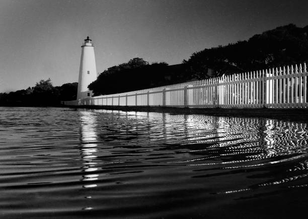 Ocracoke LIghthouse The 75-foot tall Ocracoke Lighthouse is in Ocracoke, North Carolina, at the southern end of Cape Hatteras National Seashore and was built in 1823. ocracoke lighthouse stock pictures, royalty-free photos & images