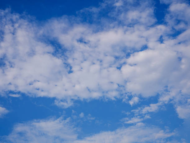 istock Beautiful cloudy blue sky during the day 864428184