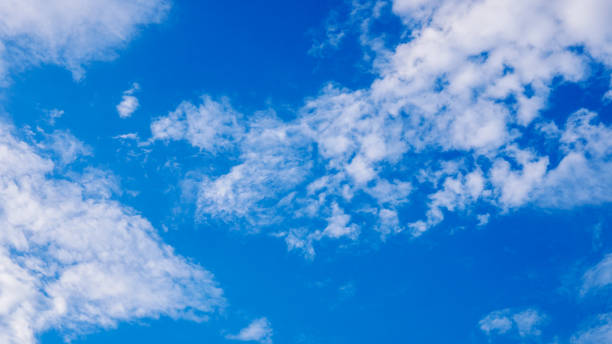 istock Beautiful cloudy blue sky during the day 864428556